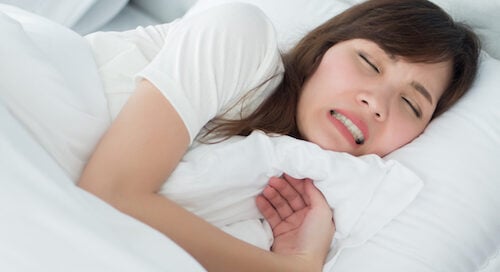 Woman Grinding Teeth in Sleep
