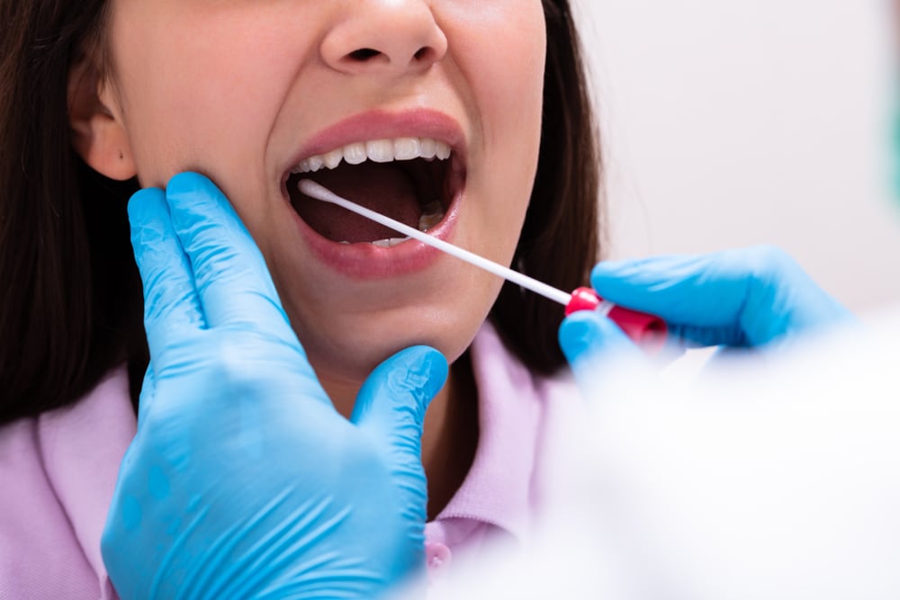 Mouth Swab Checking Saliva for Oral Health