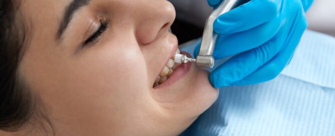 young woman getting her teeth cleaned